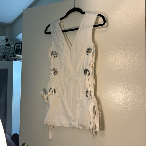 White top with grommets and ties on sides - Picture 1 of 3